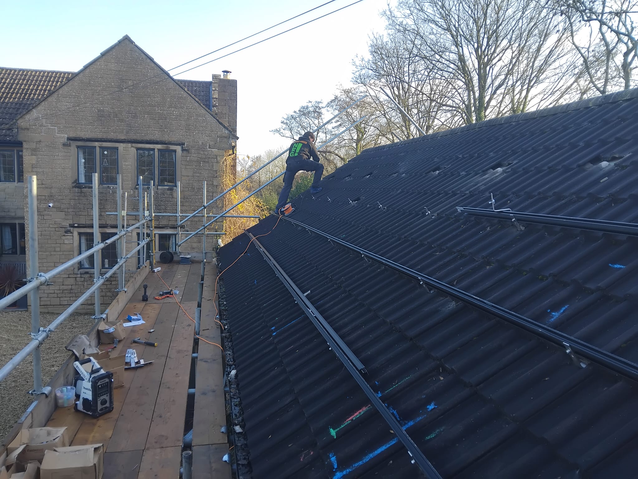 Man working on solar panels